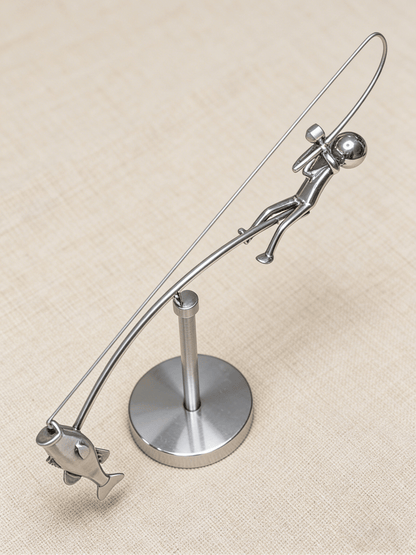 Figurka rybaka z efektem balansu 🎣