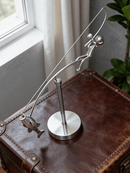 Figurka rybaka z efektem balansu 🎣